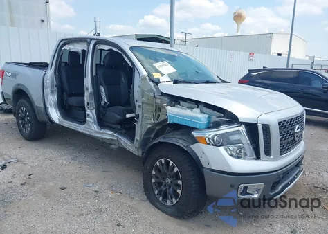 2019 Nissan Titan Pro-4X z USA, uszkodzony, nr VIN 1N6AA1E51KN523784